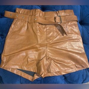 Brown leather shorts. Size medium. Worn once just to take pictures.